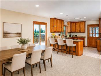 Dining and kitchen area - virtually staged