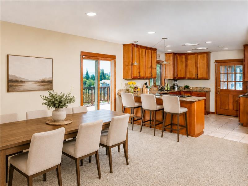 Dining and kitchen area - virtually staged