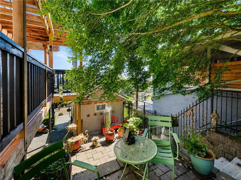Terrace south yard with large garden shed at the bottom.