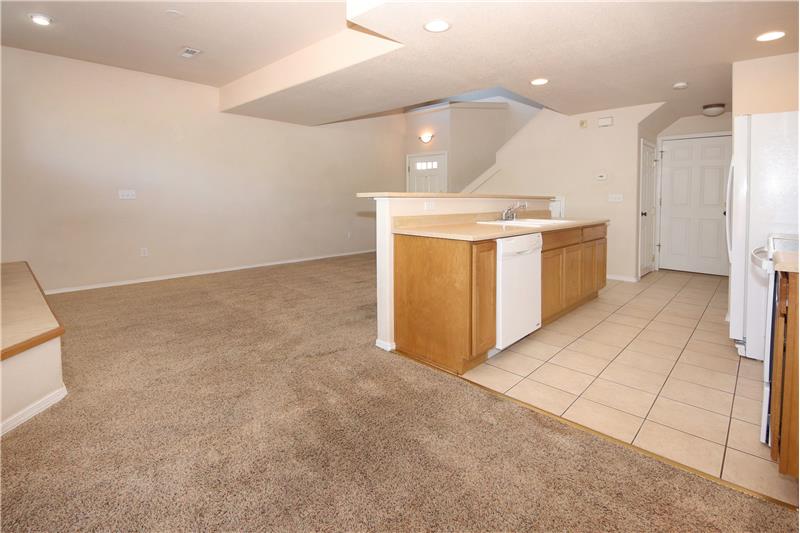  View of the Living Room and Kitchen from the Dining Area
