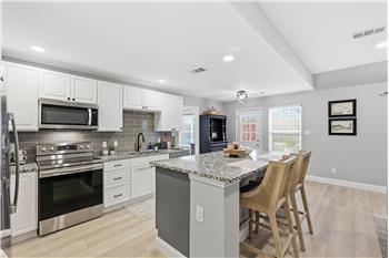 Nicely appointed kitchen with breakfast bar for casual dining