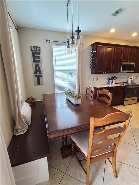 Banquette seating w/ hidden storage tucked beneath