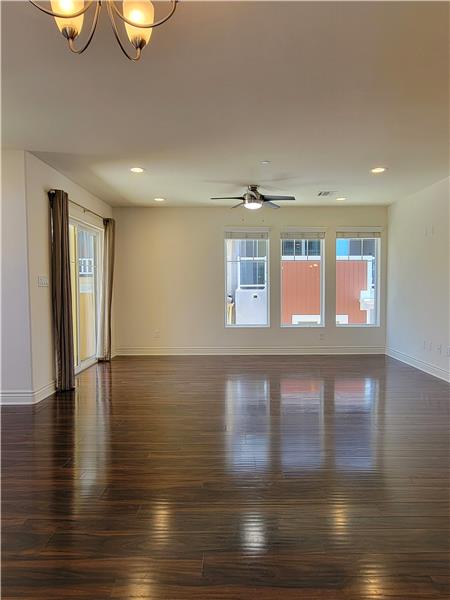 Living Room, along with 2 Bedroom Suites, have adjustable lighting/fans!