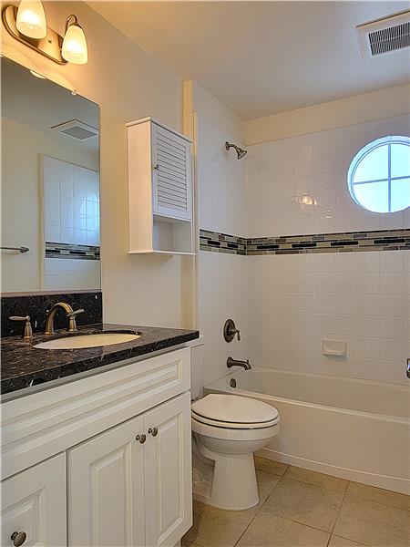 Family & guests alike revel in being able to have their own bathroom. This home has Four Bathrooms!