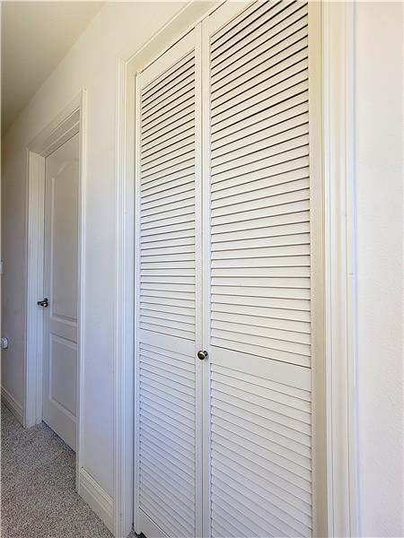 Smartly disguised laundry area...