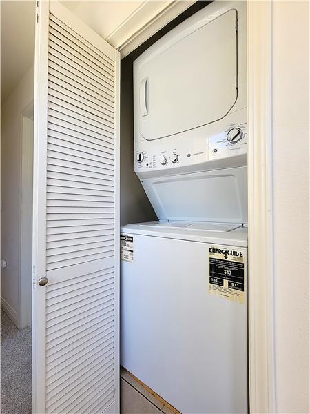 Conveniently located near both 3rd floor bedrooms, a GE Unitized Spacemaker Washer & Dryer. Smart design!