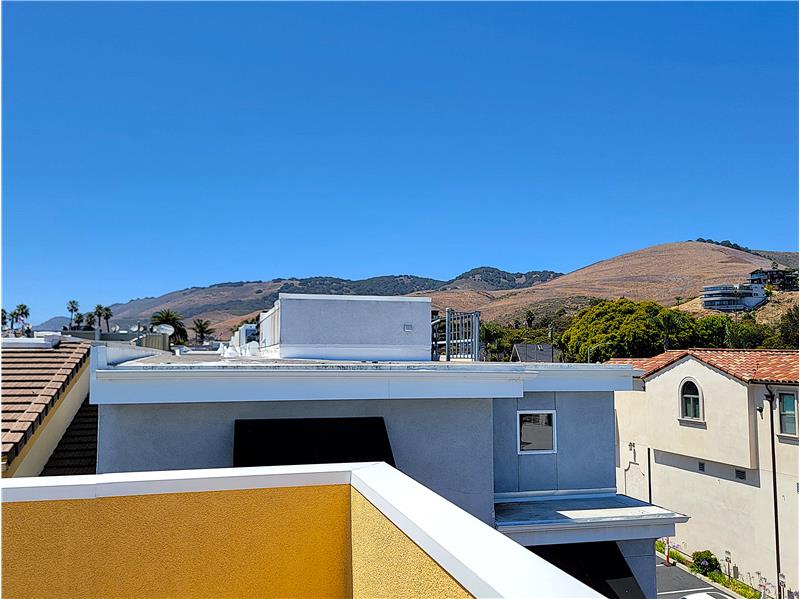 That hillside is the 900 Acre Pismo Preserve! 11 miles of hikes, runs, mountain biking and horseback riding.