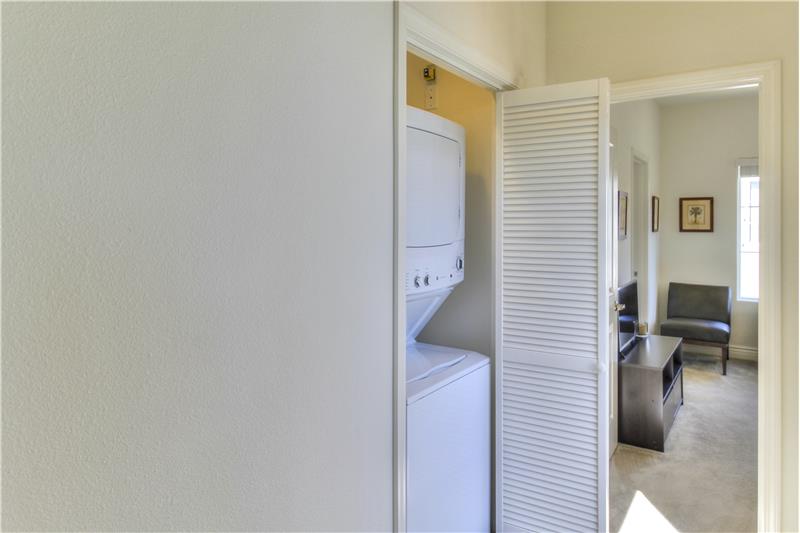 Conveniently located between both bedrooms, a GE Unitized Spacemaker Washer and Dryer. Smart design!