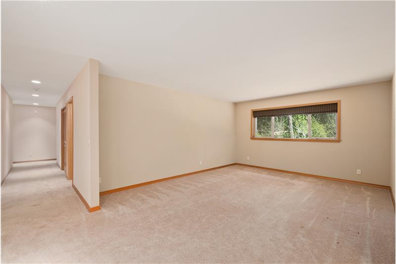 Living Room 2 provides another flexible-use space. Hallway leads to main bath and 3 Bedrooms.