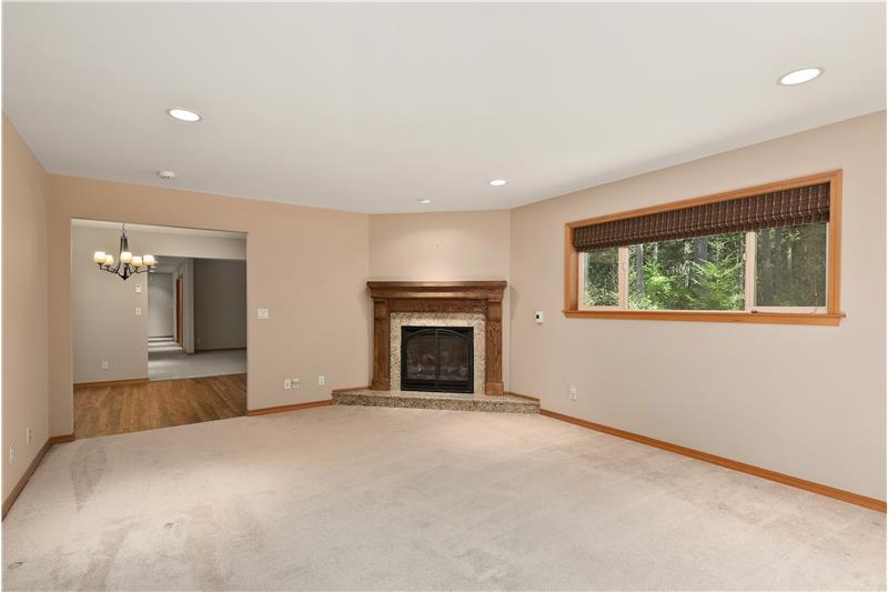 Living Room 1 features a built-in gas fireplace