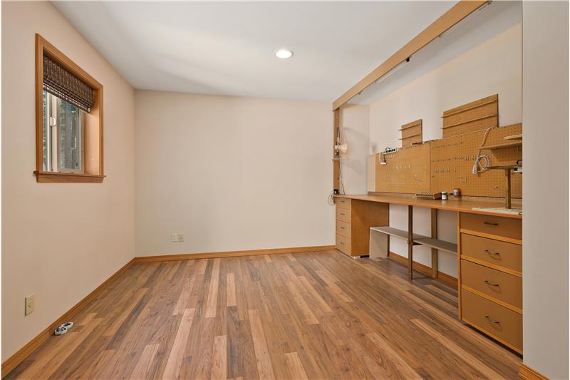 How many ways can you use this bonus room adjacent the garage—A Hobby room? Workshop? Office? Exercise Room? The choice is yours