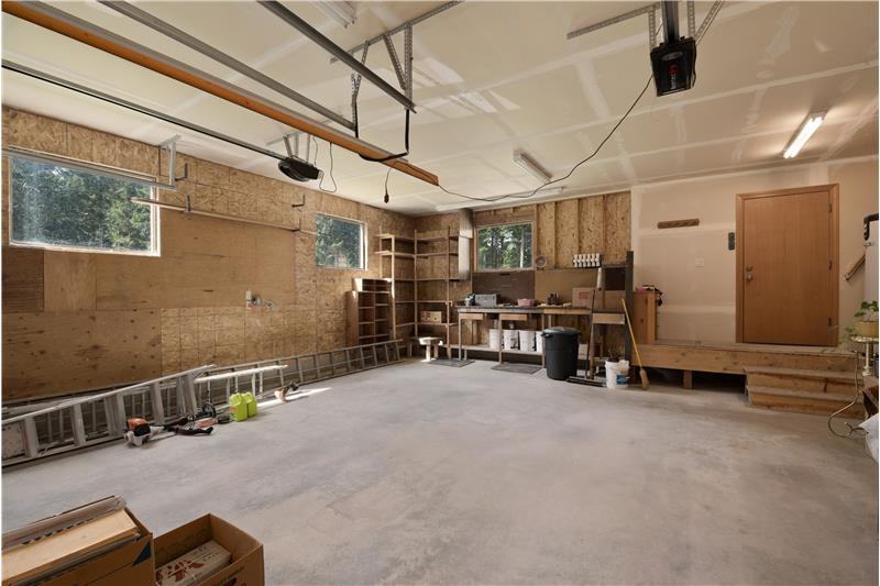 This oversized garage is deeper than average providing plenty of working space and storage.