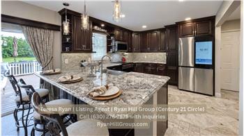 25-by-17-foot eat-in kitchen offers space for cooking, storage, and casual dining