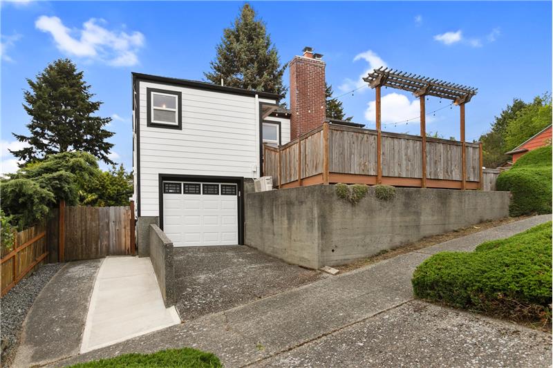 One Car Garage plus off street for bike or smaller car.