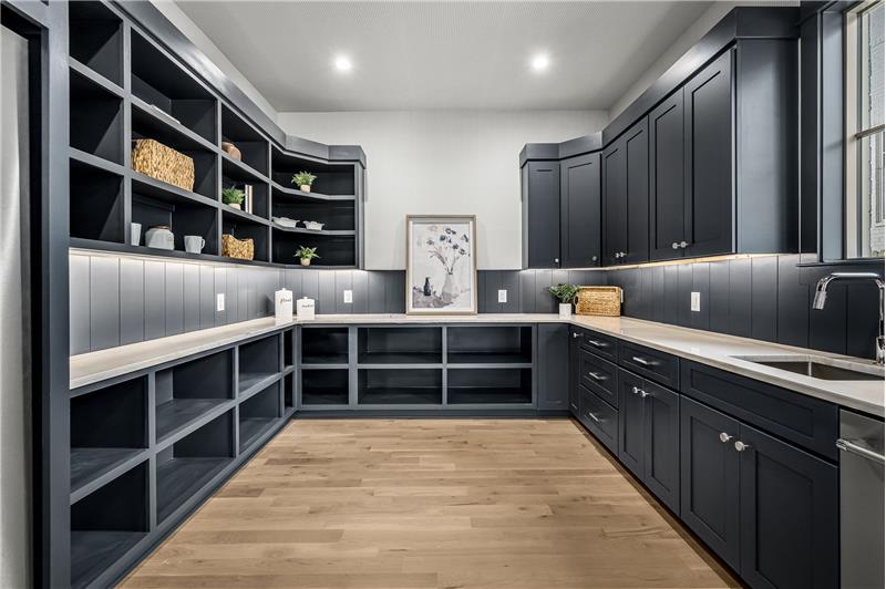 Catering pantryoff the kitchen houses extra fridge & dishwasher