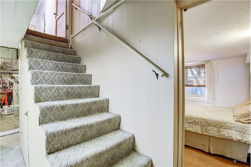 One of two stairs to basement (other from sunroom)