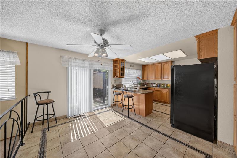 Dining Area Off Kitchen - Sliding Door Leads to Backyard