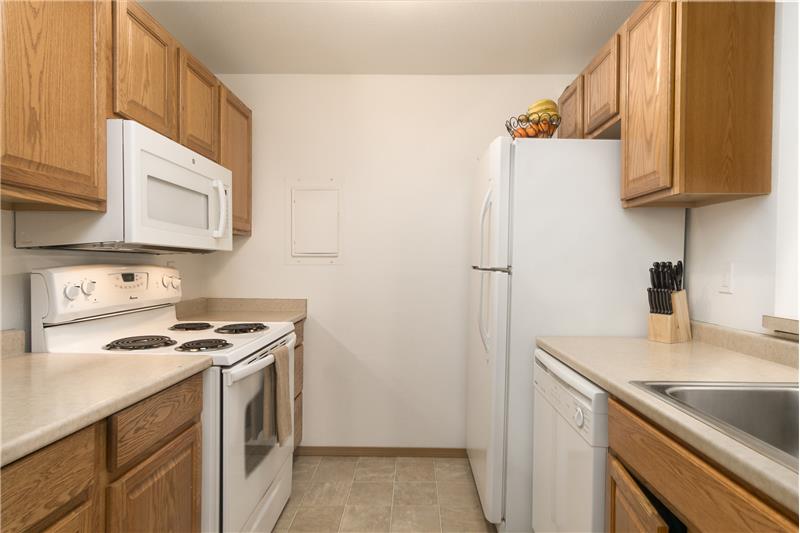 Fully equipped kitchen with built-in dishwasher, microwave and all appliances included.
