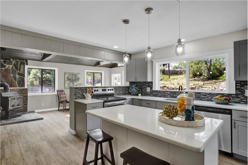 Gourmet Kitchen into the Vaulted Dining Room/Sun Room