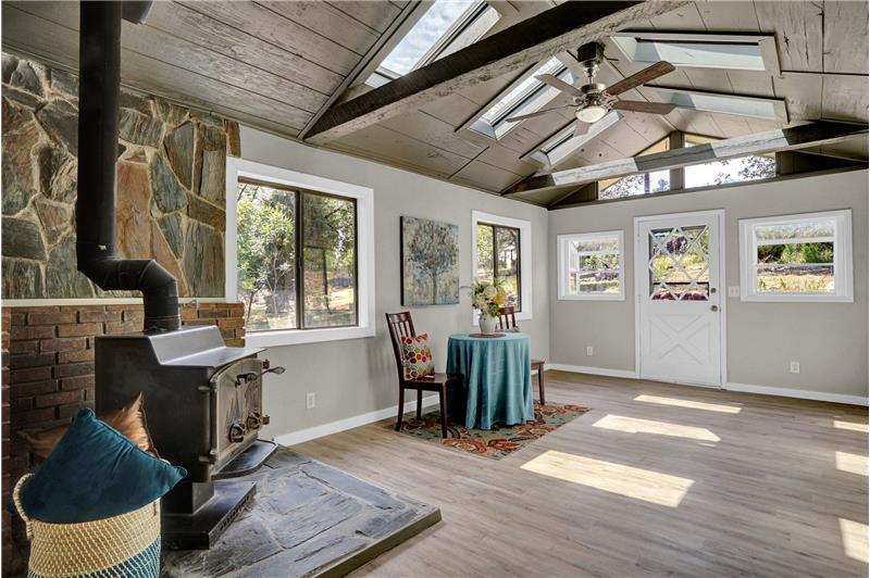 Vaulted Dining Room with wood burning stove