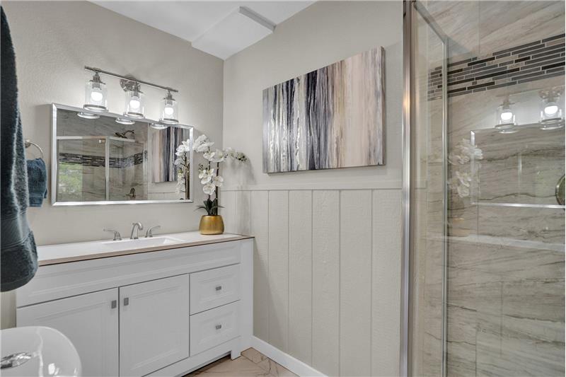 Main level Primary Shower Bathroom