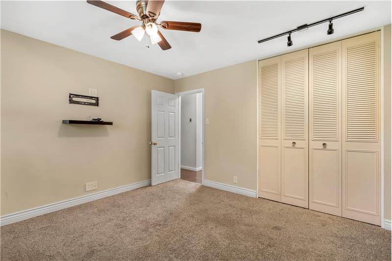 Primary bedroom has double closets