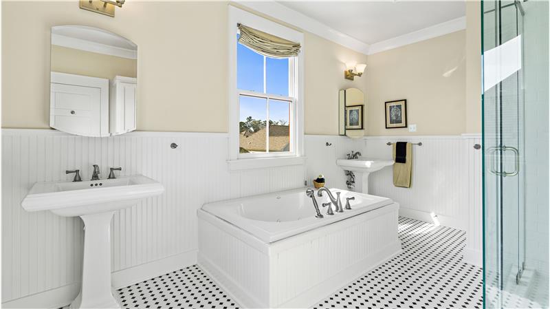 Primary bath with hydro-tub, walk-in shower, water closet for toilet