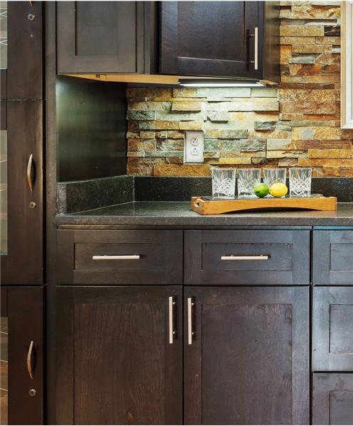 Detail of stone backsplash & wine bar