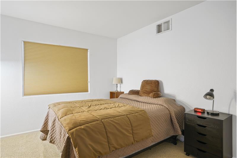 Guest bedroom with room darkening blinds
