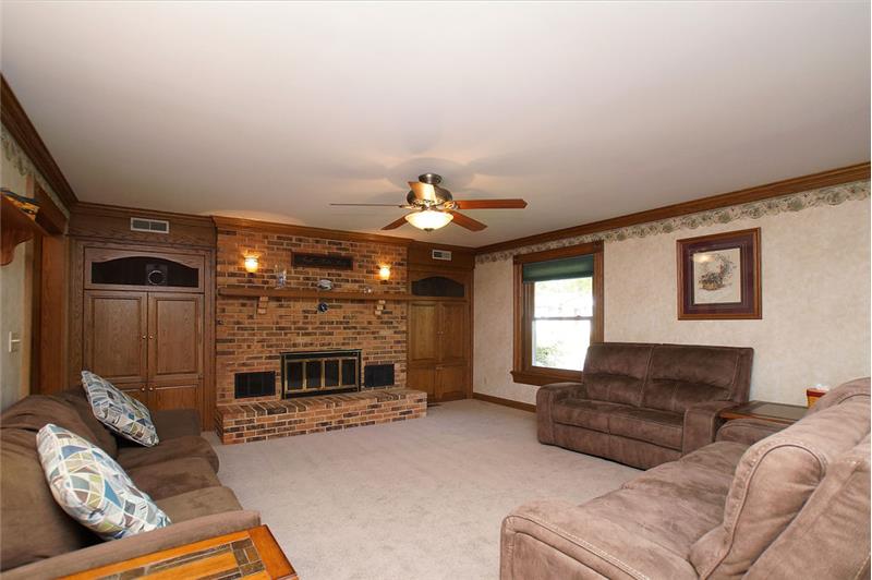 Wood burning fireplace in living room