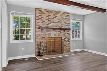 Family room - Brick wood burning fireplace