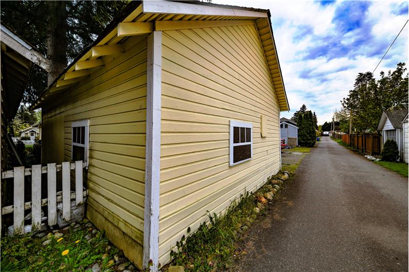 Another angle of detached garage with alley access.