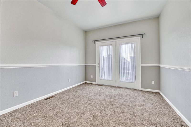 Secondary bedroom with Juliette balcony