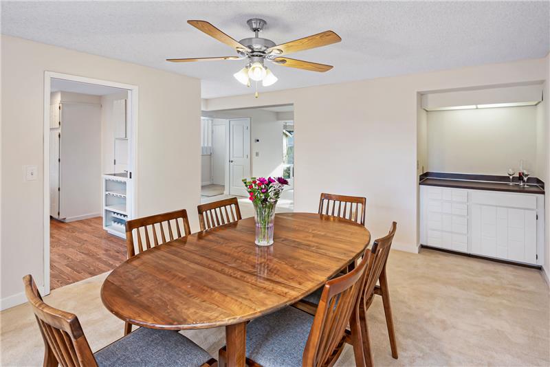Formal Dining room with a bar or storage for dinnerware.