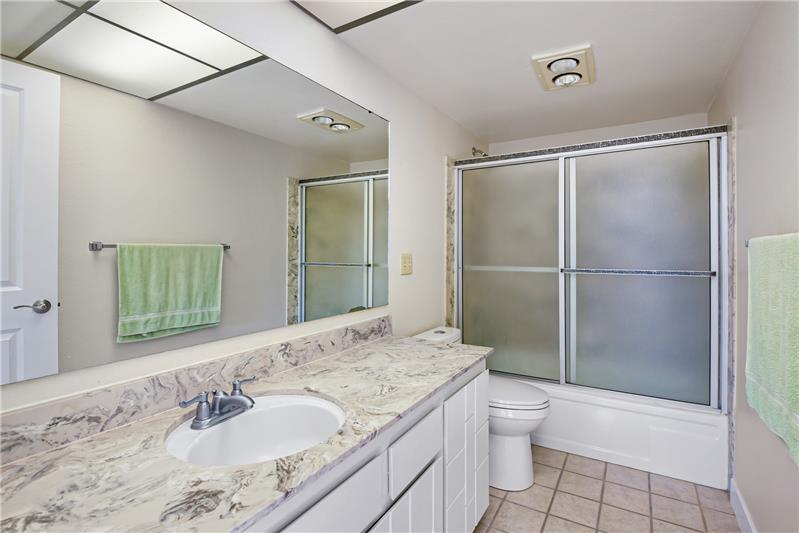 Full size bath on the 2nd floor across from the bedrooms