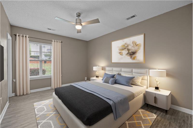 Virtually staged primary bedroom with designer fan