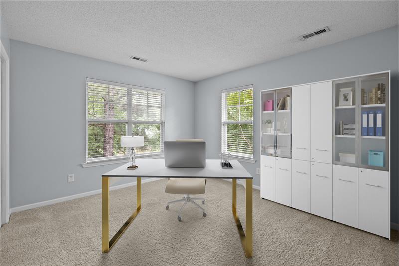 Virtually staged second floor bedroom showing as a home office