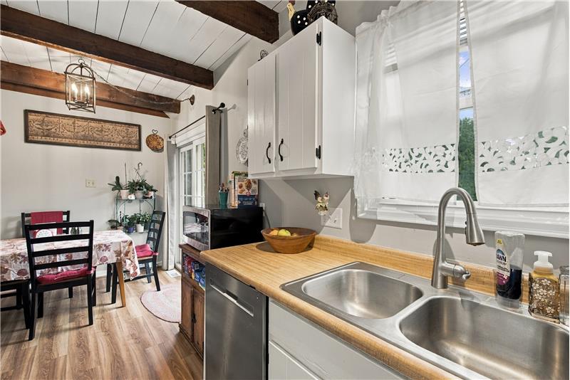 Kitchen & Dining Area Lead to Back Deck