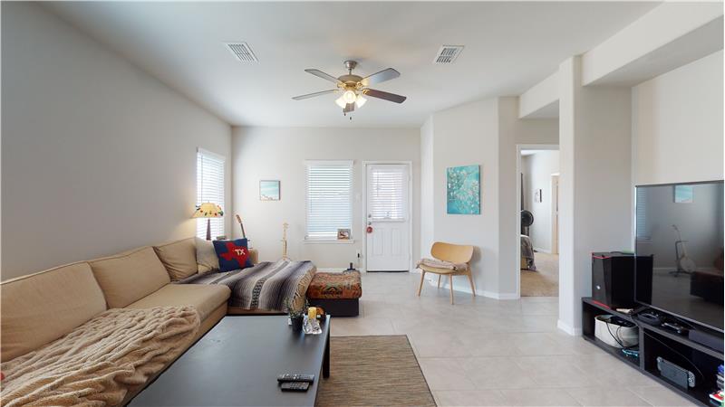 The family room offers plenty of natural light and is great for all your guests.