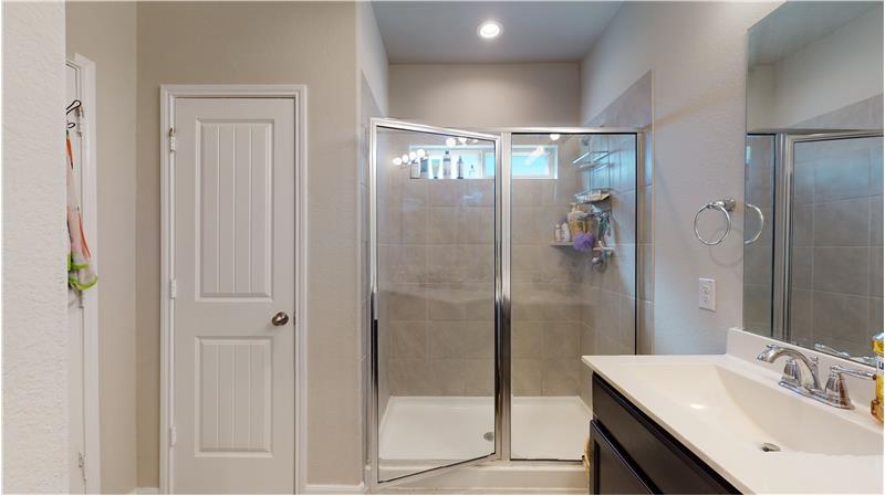 The master bath features a large walk in shower.