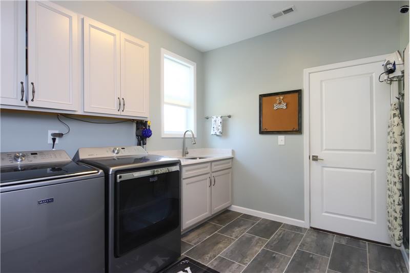 Laundry Room With Gorgeous Tile, Sink & Cabinetry