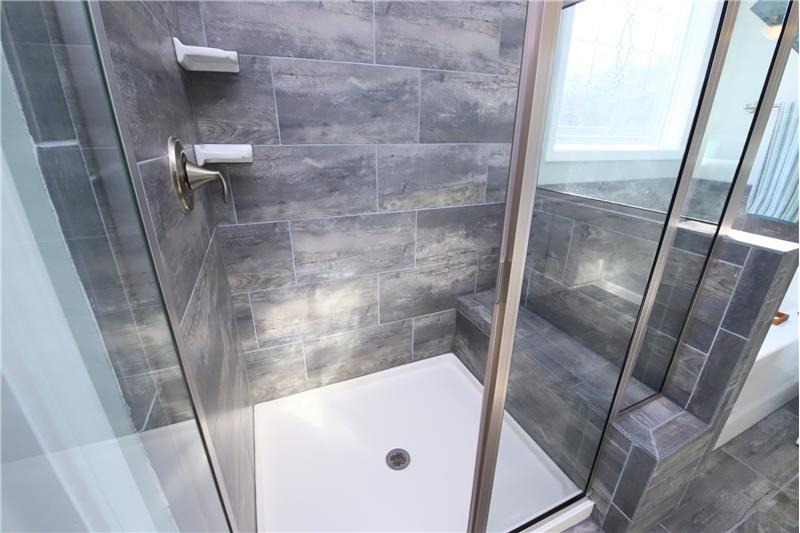 Beautiful Tile Shower With Seat & Shelving
