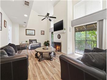 High ceilings and lots of light with windows opening onto the tree lined street.