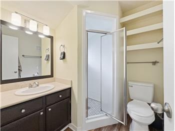 Secondary bath wth updated shower and pan.