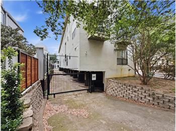 Entry to parking garage under the building.