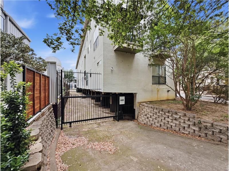 Entry to parking garage under the building.