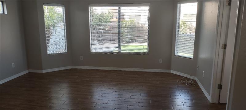 Owner's bedroom overlooks grassy back