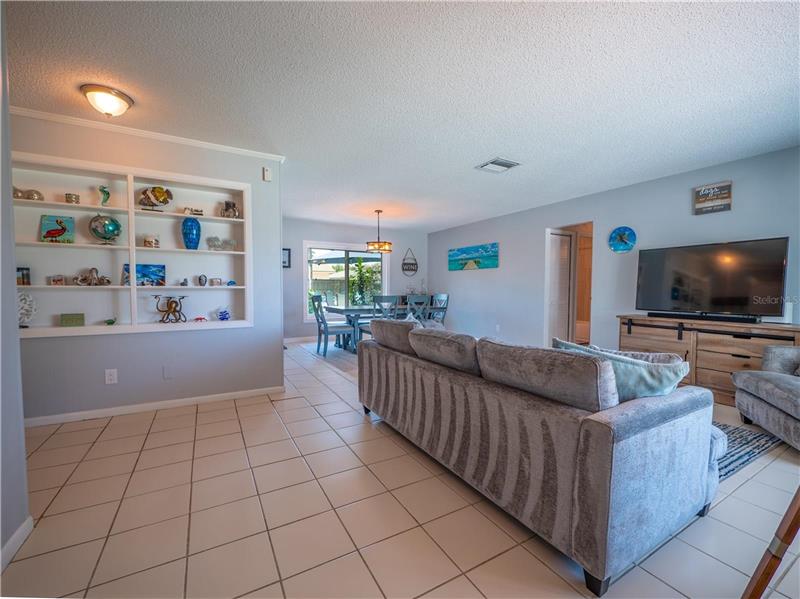 View of living room and dining area from foyer