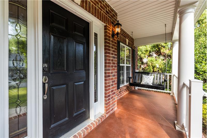 Front door with leaded glass side light windows