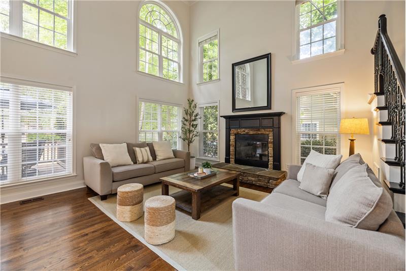 Windows on two walls provide outstanding natural light in the great room